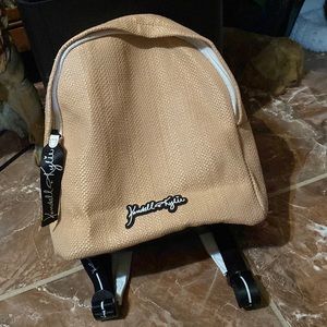 This is a Kendall + Kylie mini straw backpack.